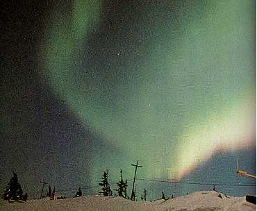 De aurora borealis vertoont zich in allerlei vormen.